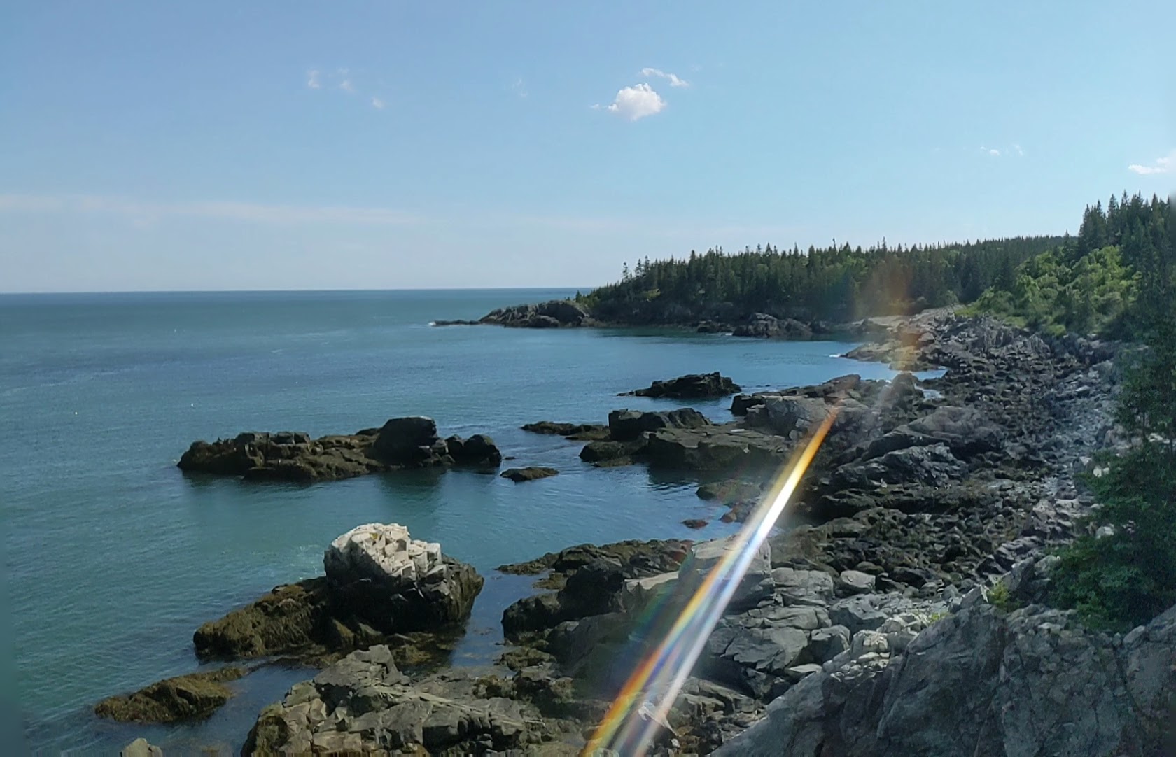 Photo of shore with some lens flare