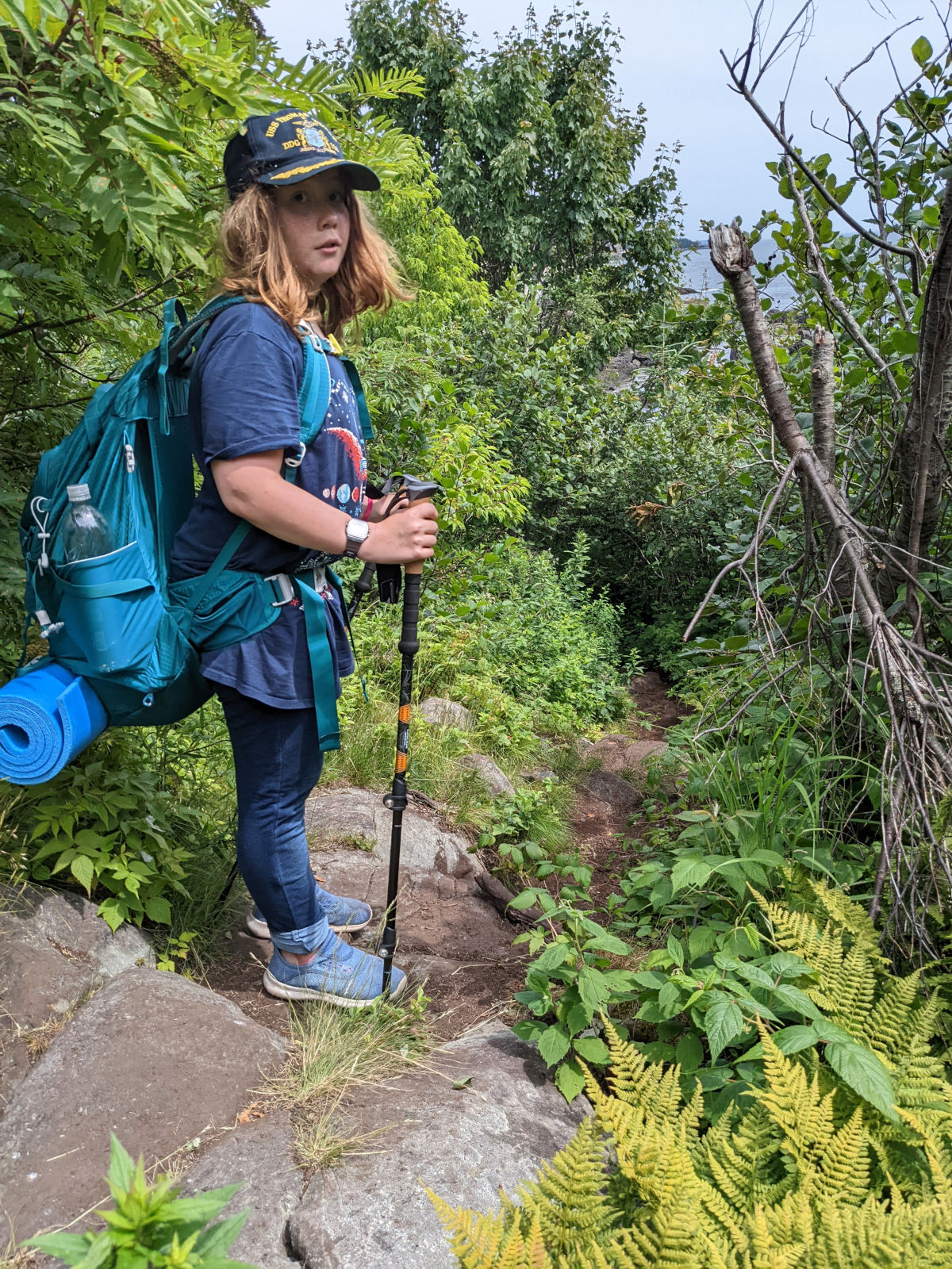 Fiona standing at the top of a steep trail