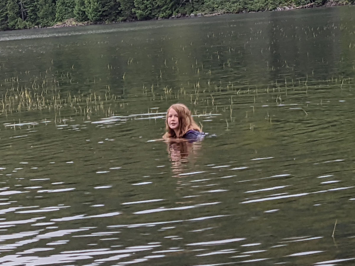 Swimming near weeds