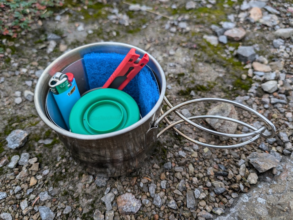 Cook set components except cup packed into the cook pot