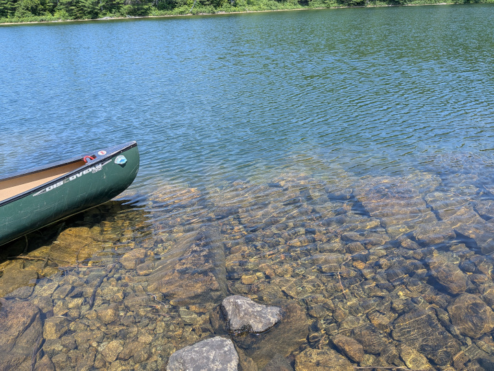 Canoe on very clear water
