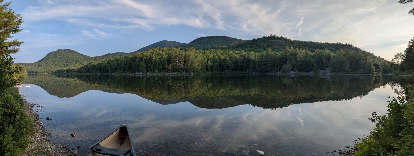 Bald Mountain, North Traveler Mountain, and Barrel Ridge reflected on very calm Middle Fowler Pond