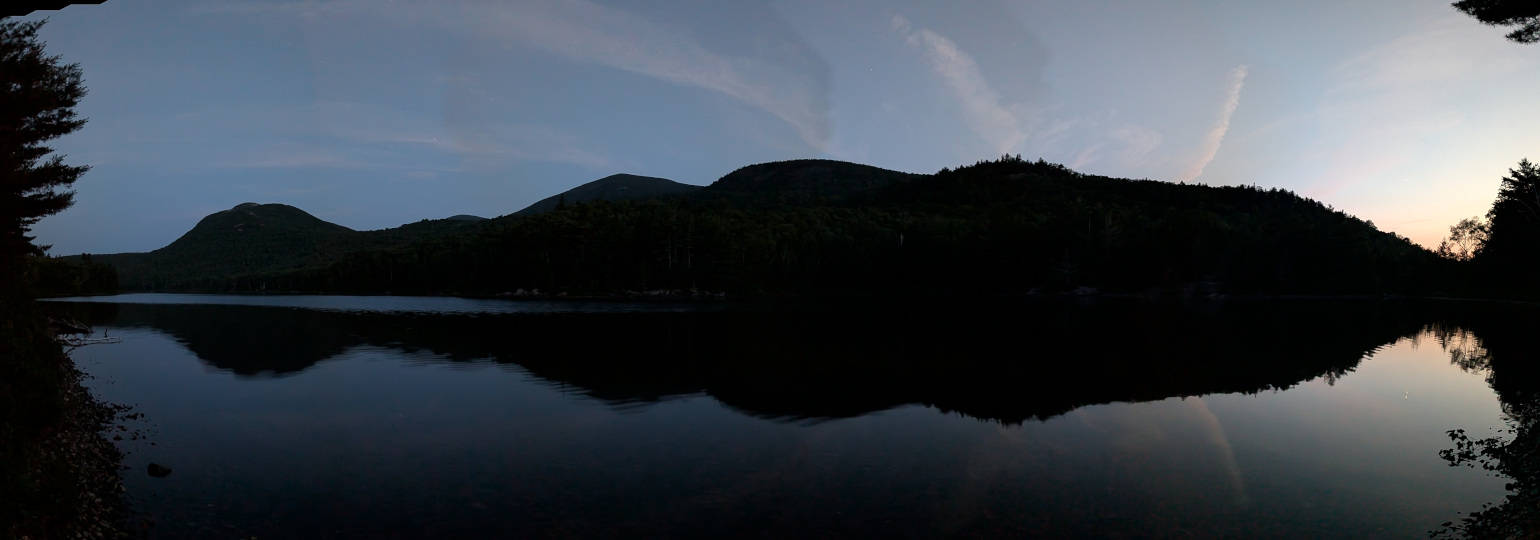 Bald Mountain, North Traveler Mountain, and Barrel Ridge reflected on very calm Middle Fowler Pond after dark