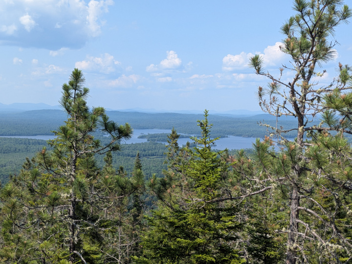 Part of Grand Lake Matagamon including Togue Ledge visible in distance
