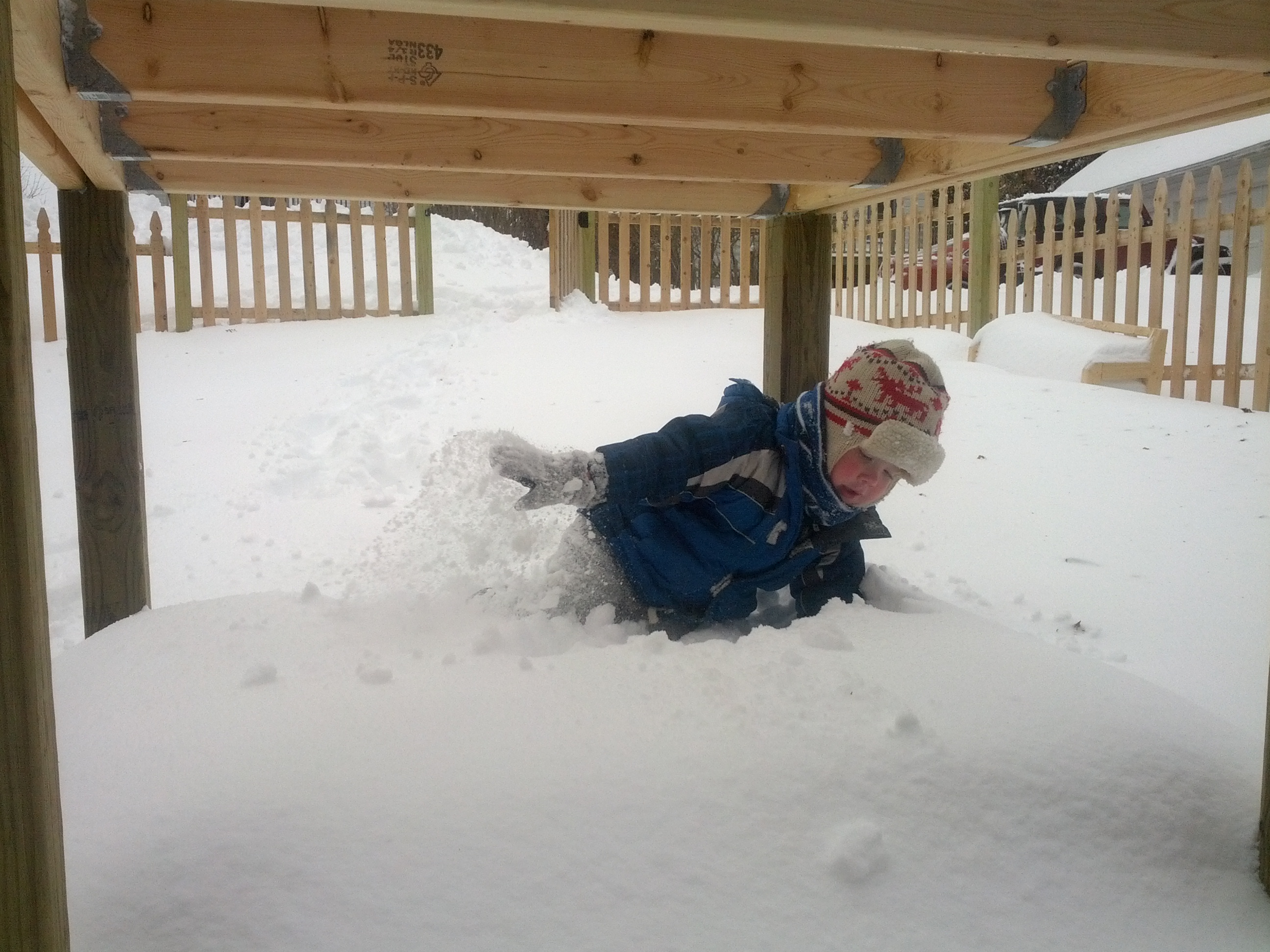 Trying to dig out the sandbox after the first big snowstorm