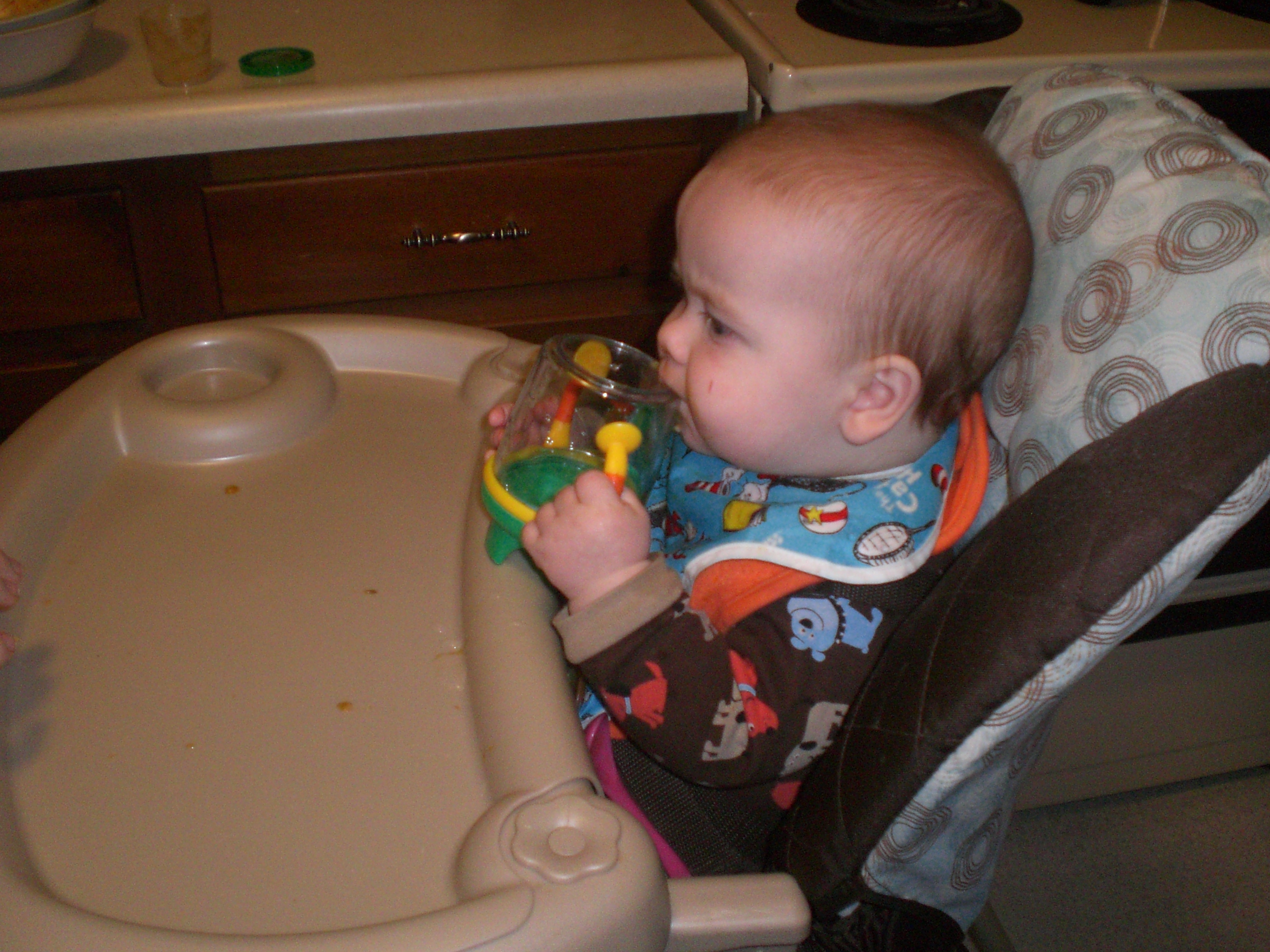 But hasn’t quite yet mastered the art of the sippy cup